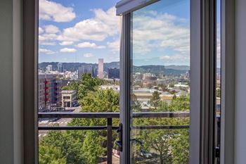 Private balconies with city & mountain views